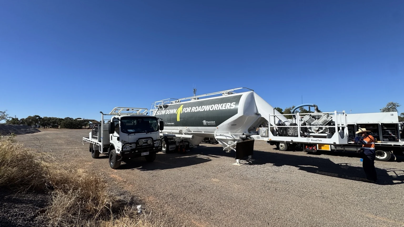 12Mech service truck with a road crew's bitumen tanker and plant